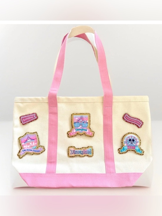 Disney Handbags - Cream & Pink Bloomingdale’s canvas Tote with Disney Stoney Clover Lane Patches